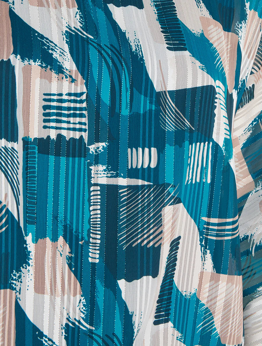 Blusa de gasa estampada con detalles irisados